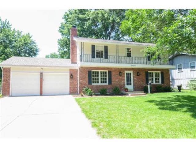 Brick two-story house in Overland Park bought and renovated by KC Local Buyers